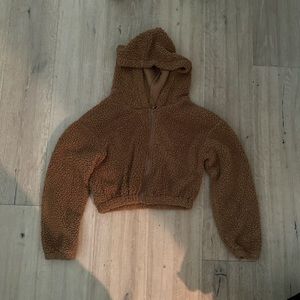 fluffy brown cropped zip up
